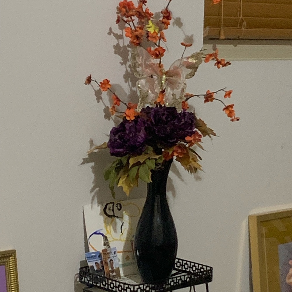 Elegant Black Vase with Purple and Orange Floral Arrangement
